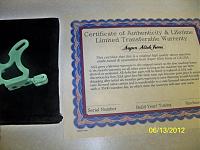 warranty 
 cert and velvet bag