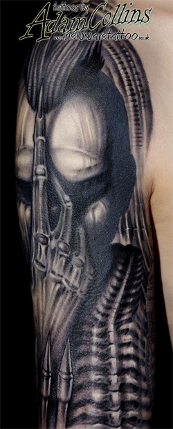 alicias alien arm tattoo by adam collins