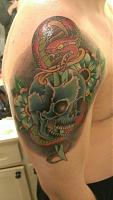 Click image for larger version. 

Name:	skull snake daggar.jpg 
Views:	94 
Size:	90.7 KB 
ID:	17259
