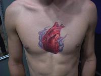 3 days after the tat. Already getting that shiny layer on top of it. Need him to come back for a healed pic.