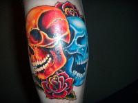 Red and Blue Skulls Tattoos